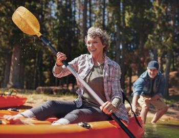 Woman kayaking on Mammoth Lakes, CA