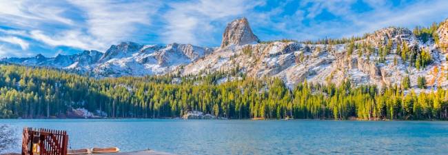 Boats at dock on Lake George under Crystal Crag at Mammoth Lakes, CA.