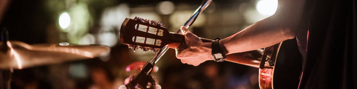 Man playing guitar on stage