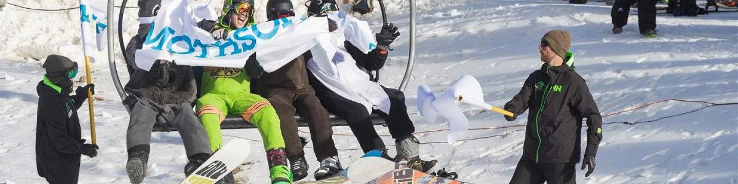 Skiiers on the lift during Mammoth Mountain's opening day