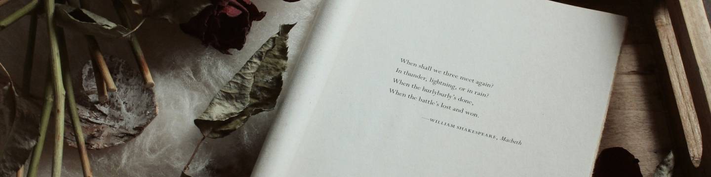 Shakespeare script in a pile of roses
