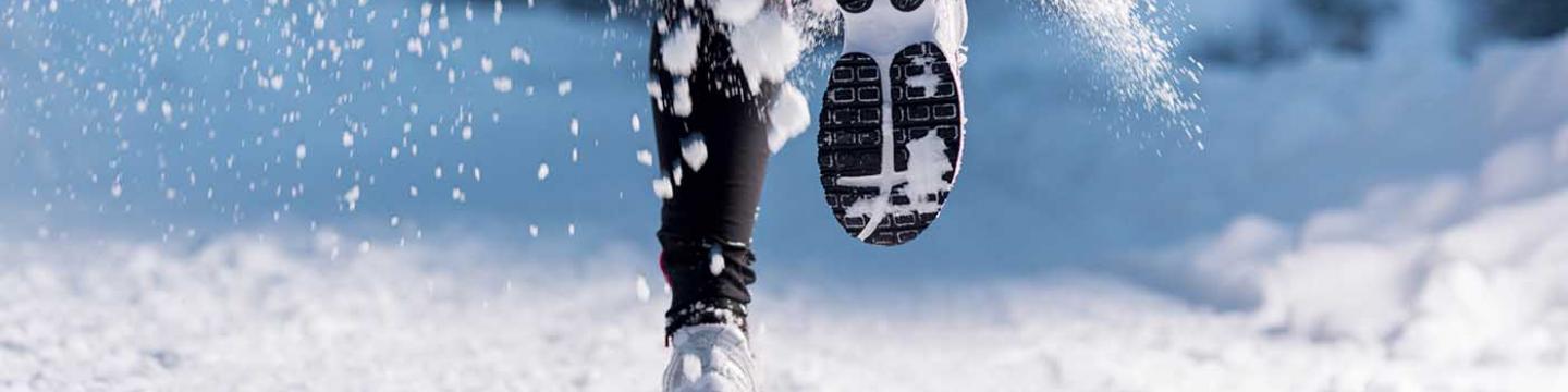 Runner's feet as she competes in a Thanksgiving Day race