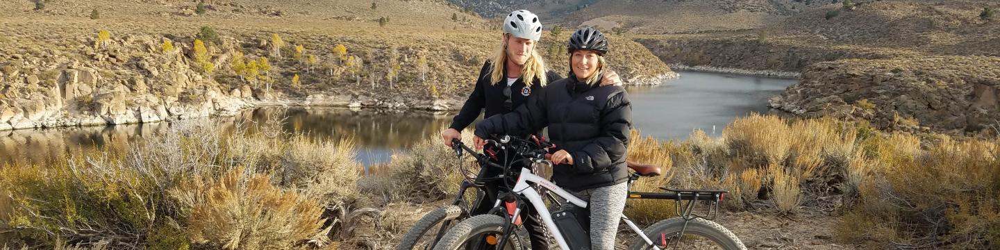 Couple on mountain bikes in Mammoth Lakes, CA
