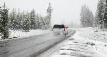 Car driving on snowy road