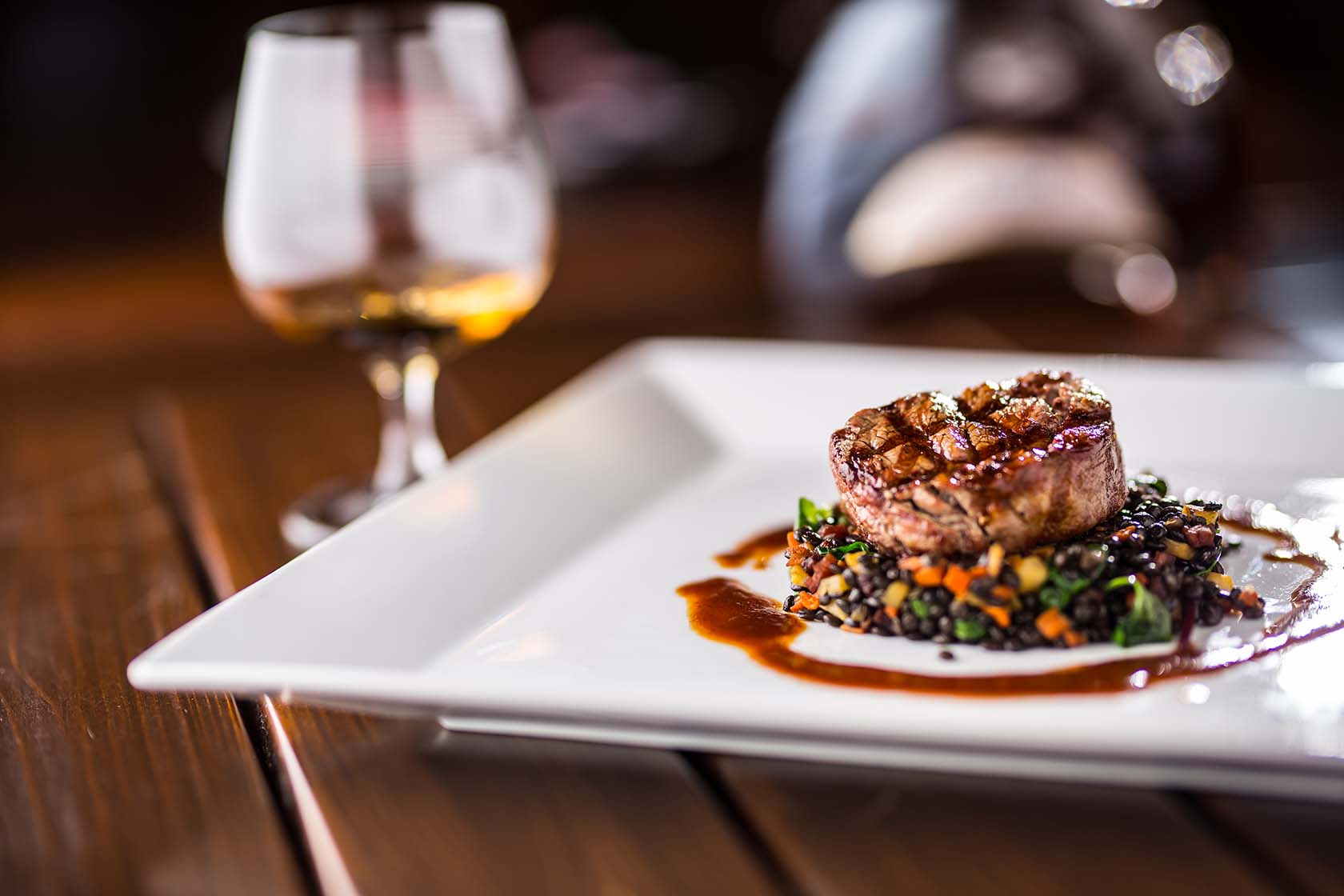 Small plate and wine at a fine dining restaurant