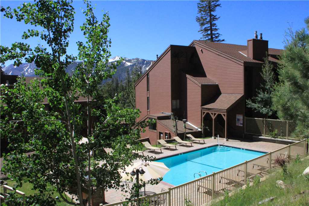 Exterior view of the pool and building at Mammoth Ski & Racquet Club